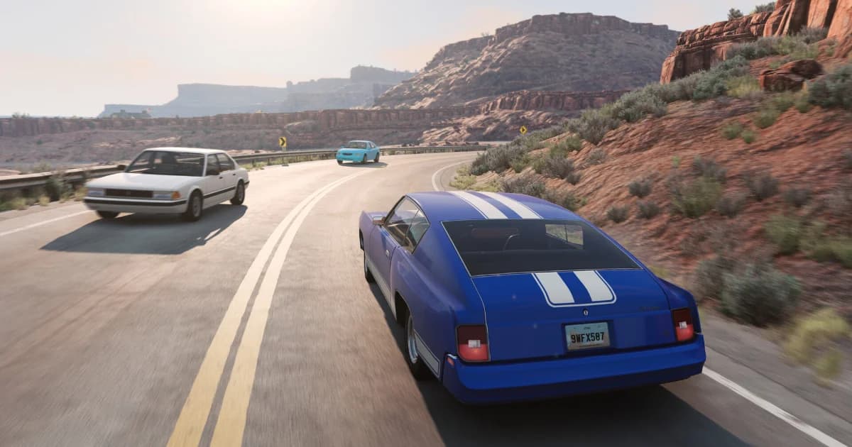 A blue muscle car on a desert highway in BeamNG.drive multiplayer